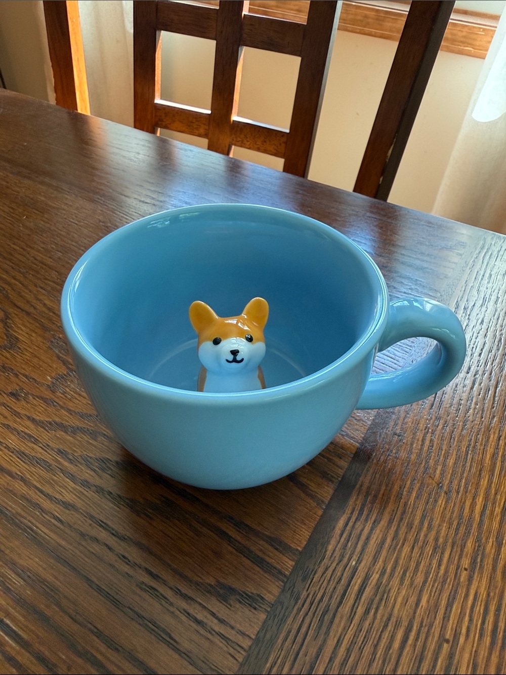 Blue Ceramic Mug with Cute Corgi Dog Figure inside.